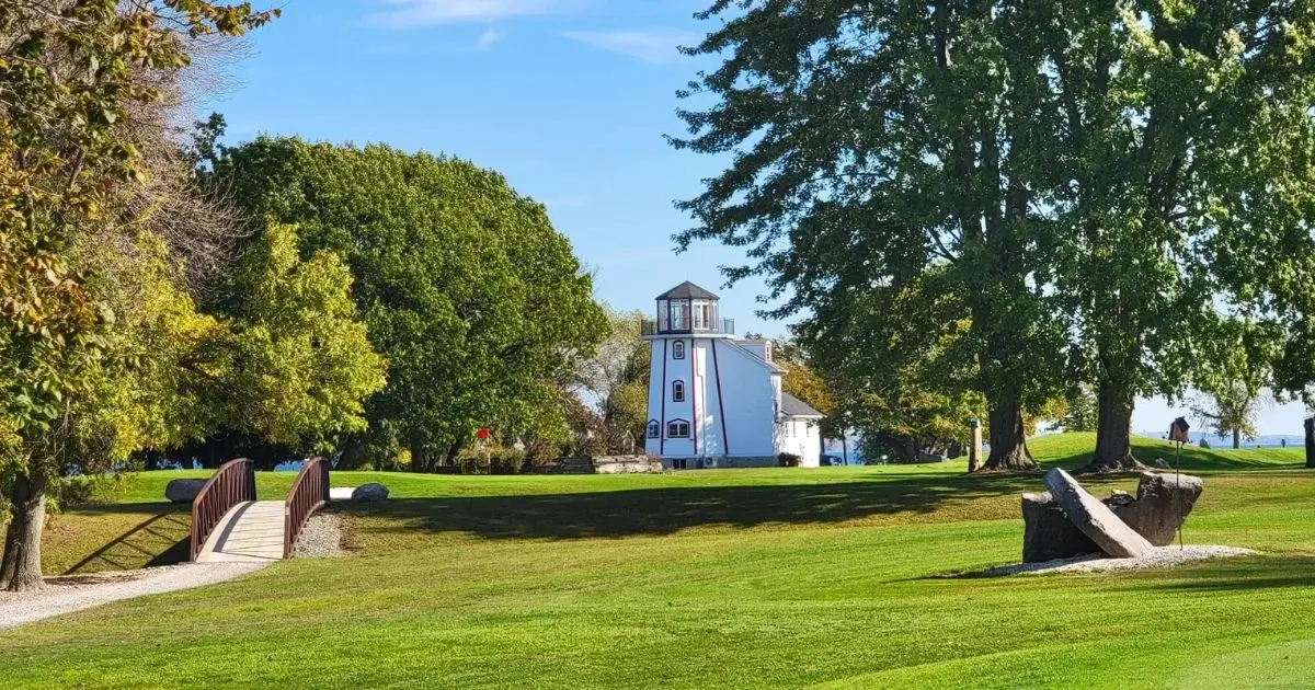 Lighthouse overlooking scenic waterfront golf course